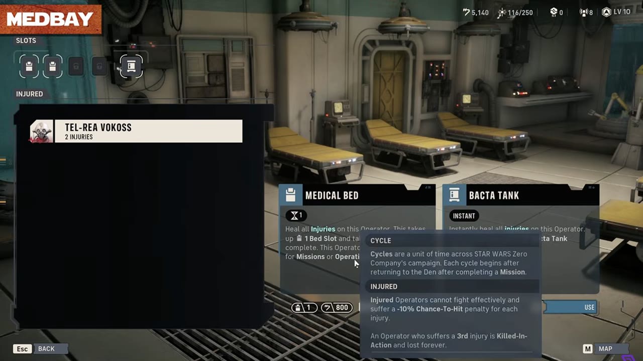 The Medbay screen showing Tel-Rea with two Injuries and the Medical Bed and Bacta Tank treatment options